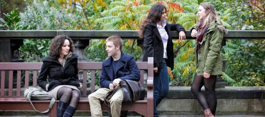 Students socialising outside on campus