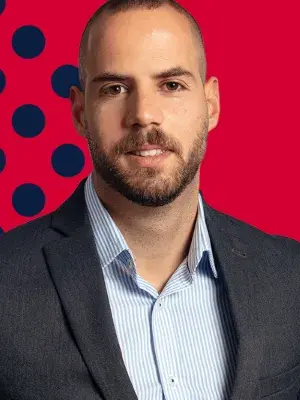 A portrait image of George Stagianos, MSc Human Resource Management graduate. 