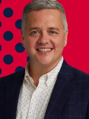 A portrait image of Paul Tambeau, MBA graduate. 
