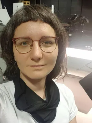 headshot of olga looking directly at the camera